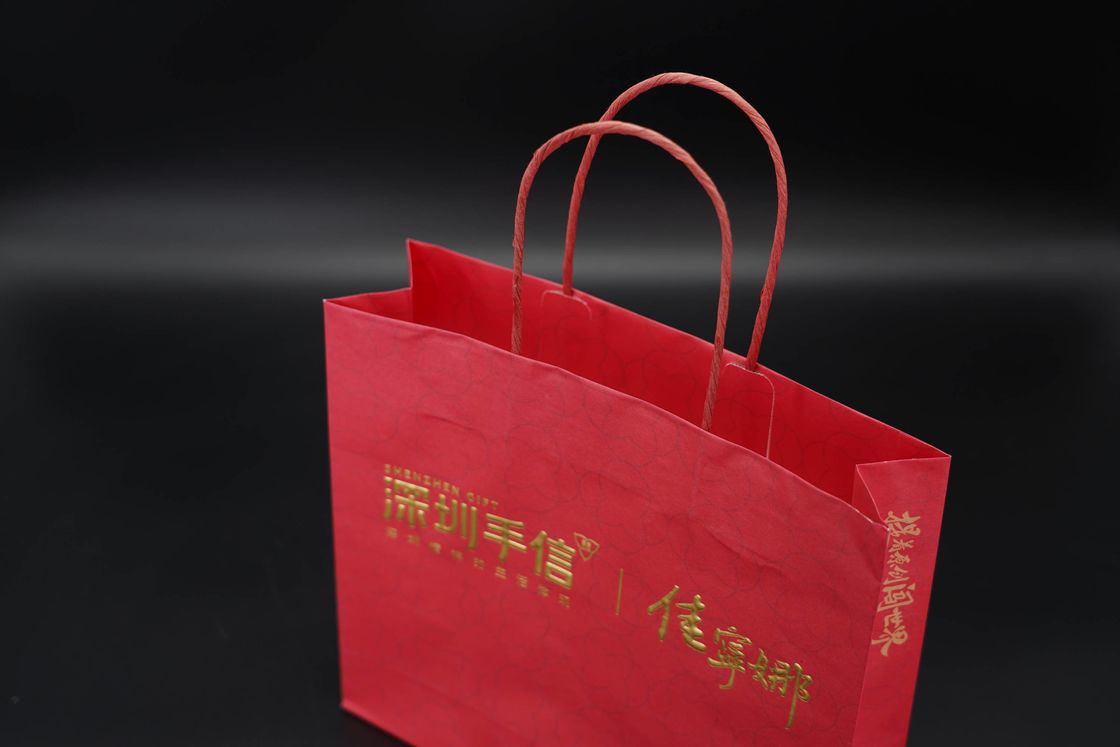 recycled Eco Paper Bags Hot Stamping Red Kraft Bags With Handles Twisted