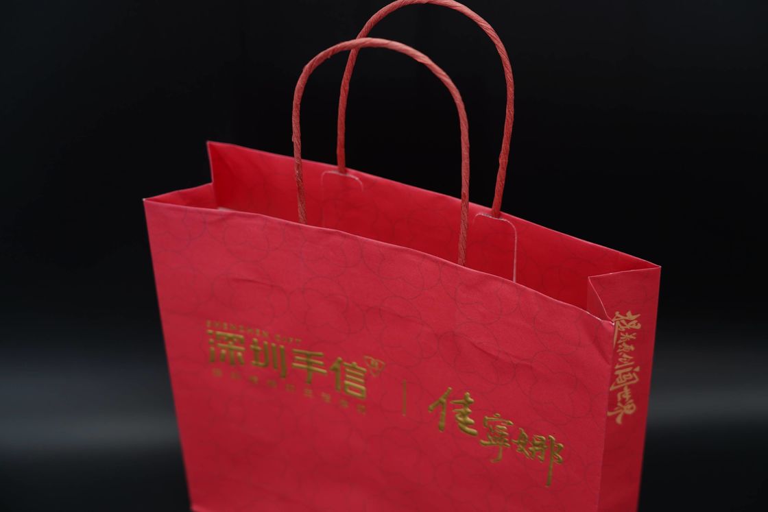 recycled Eco Paper Bags Hot Stamping Red Kraft Bags With Handles Twisted
